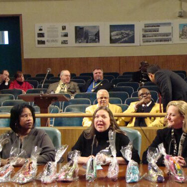 Muses-CityCouncil Krewe of Muses leaders make a presentation to members of the New Orleans City Council.