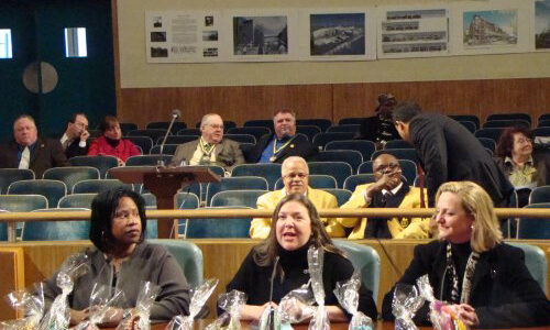 Krewe of Muses leaders make a presentation to members of the New Orleans City Council.